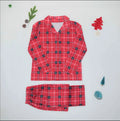 Le Pyjama de Noël à Carreaux Rouges