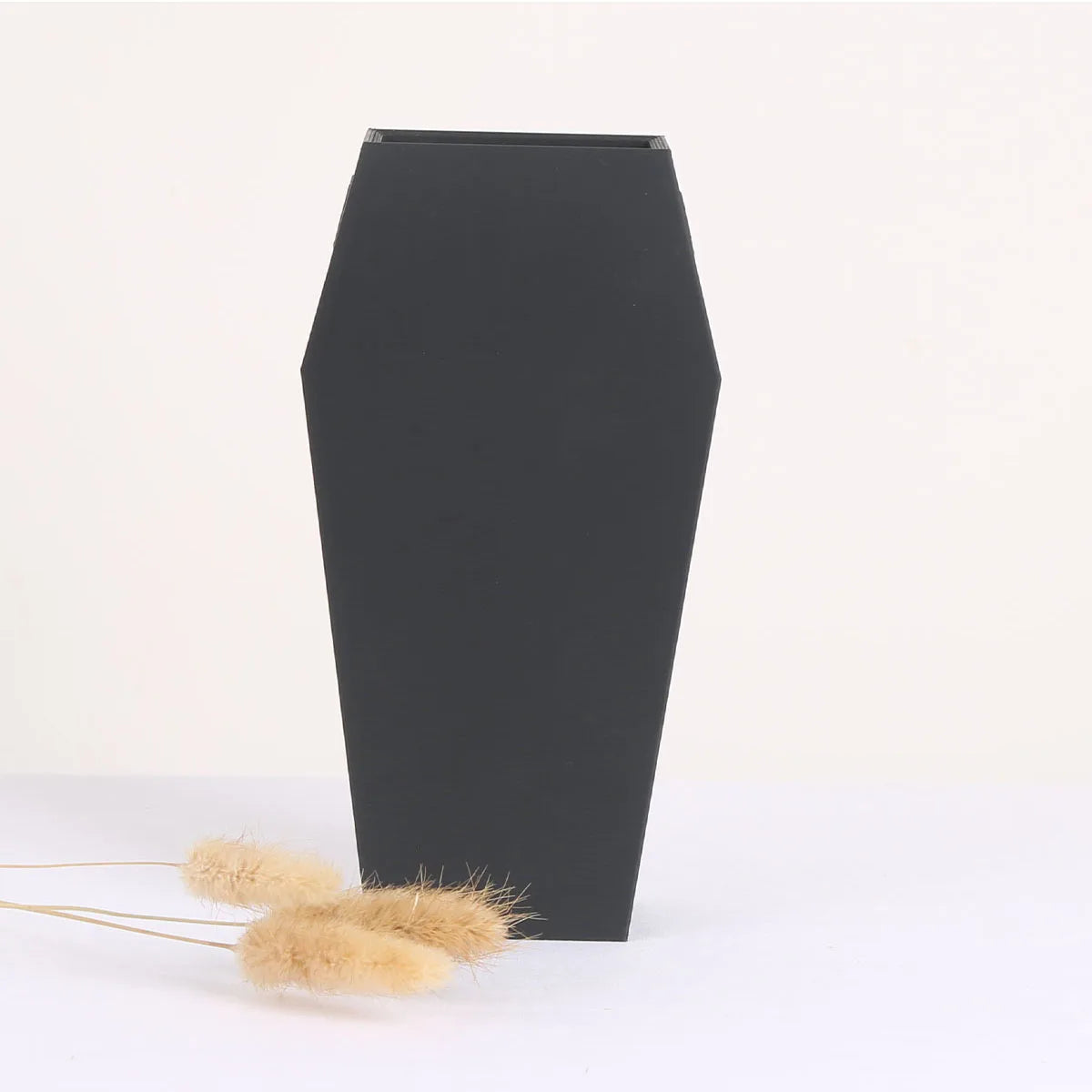 Dimensions : environ 18,4 cm de haut et 9,6 cm de large