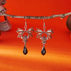 Boucles d'oreilles chauve-souris présentées