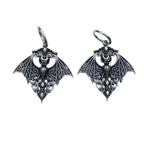 Boucles d'oreilles chauve-souris sur fond blanc