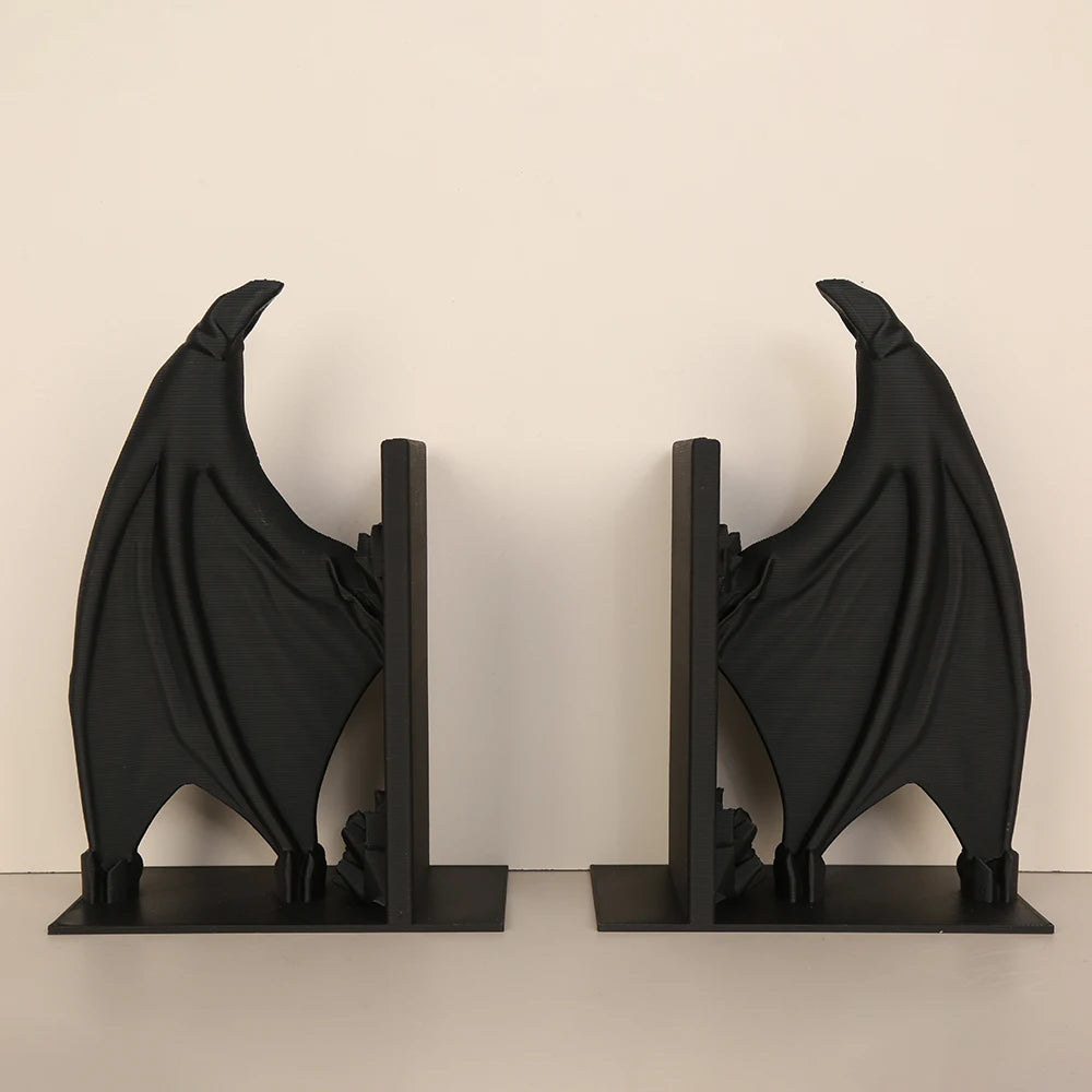 Paire de serre-livres ailes de chauve-souris noirs