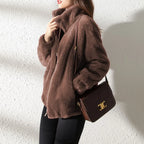 Le Manteau Peluche des Neiges