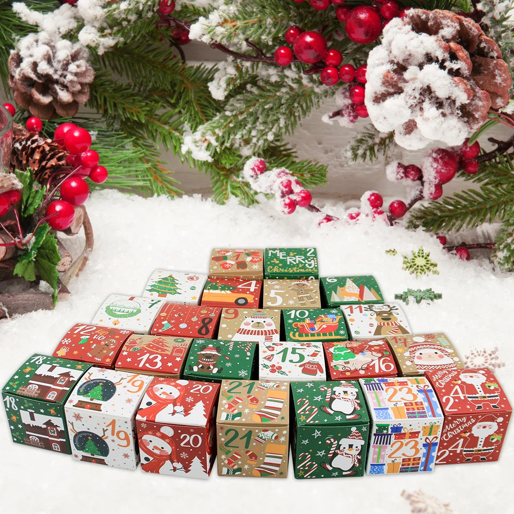 Cubes de l'Avent posés près de branches de sapin