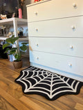 Le Tapis – toile d'araignée